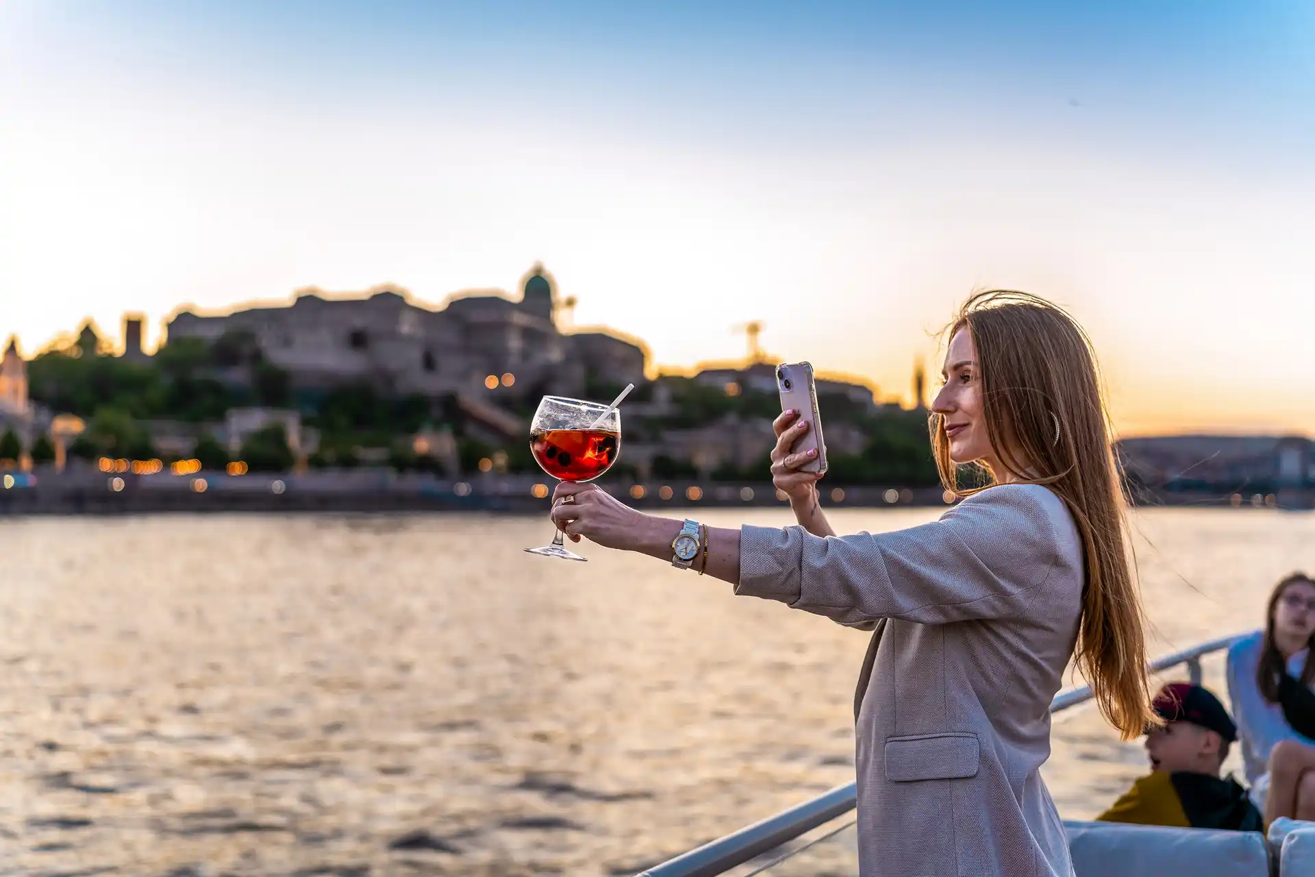 A panoramic Budapest sunset cruise sailing down the Danube during autumn twilight