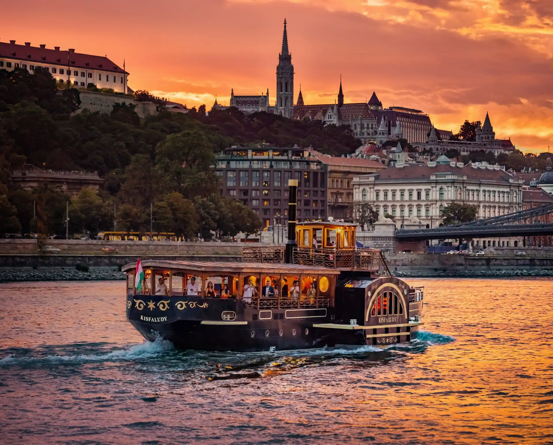 Beautiful sunset view of Budapest with Kisfaludy Paddle Steamer