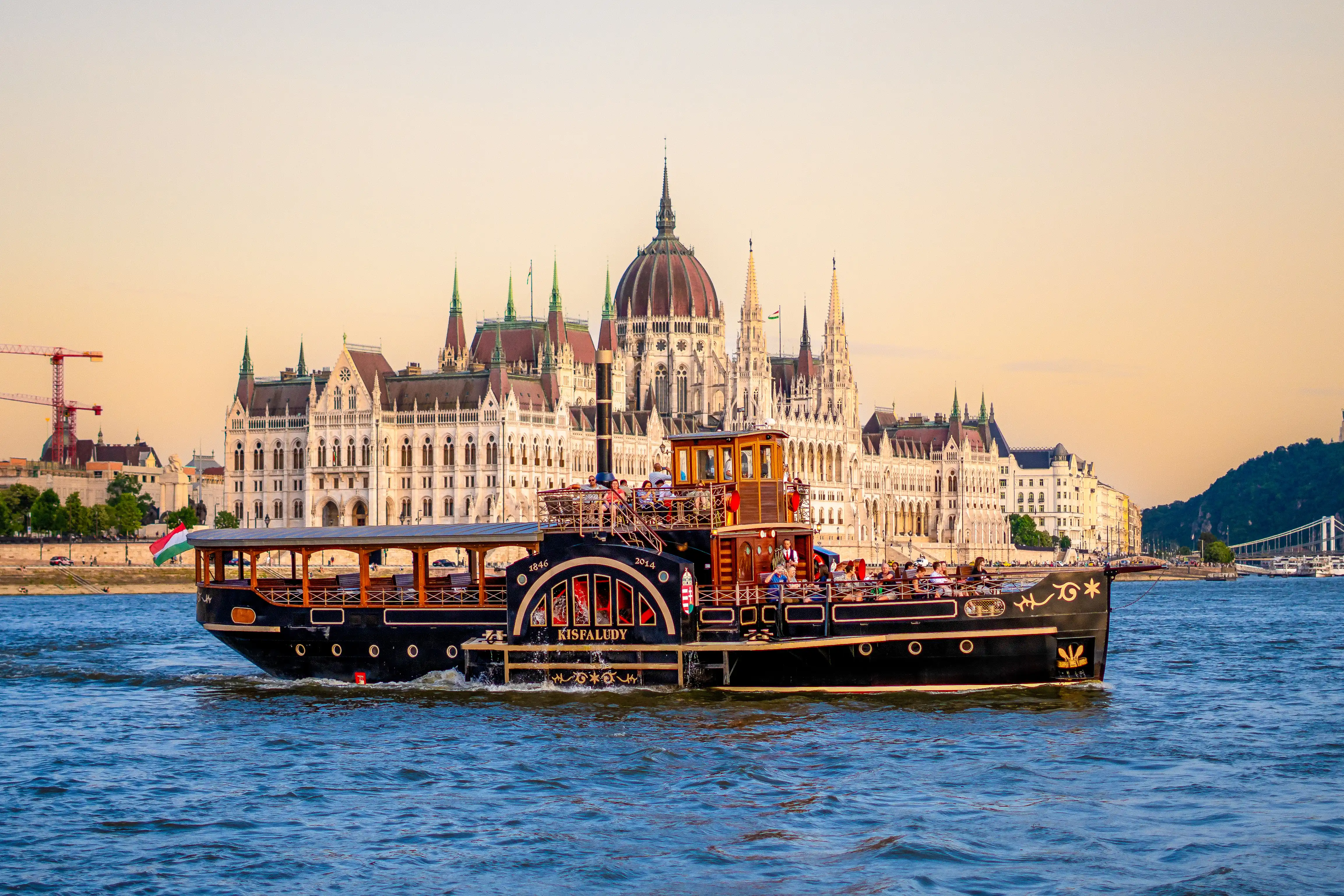 Kisfaludy historical paddle boat in Budapest in front of the Hungarian Parliament